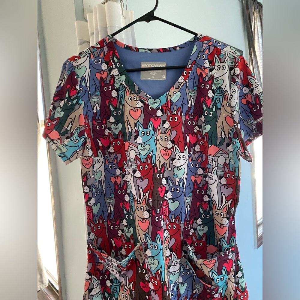 Size medium scrubs top animal print